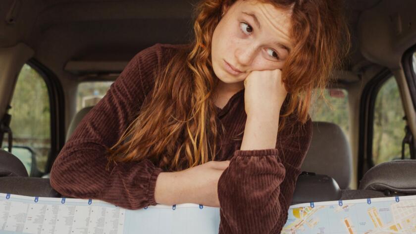 medium-shot-girl-with-map
